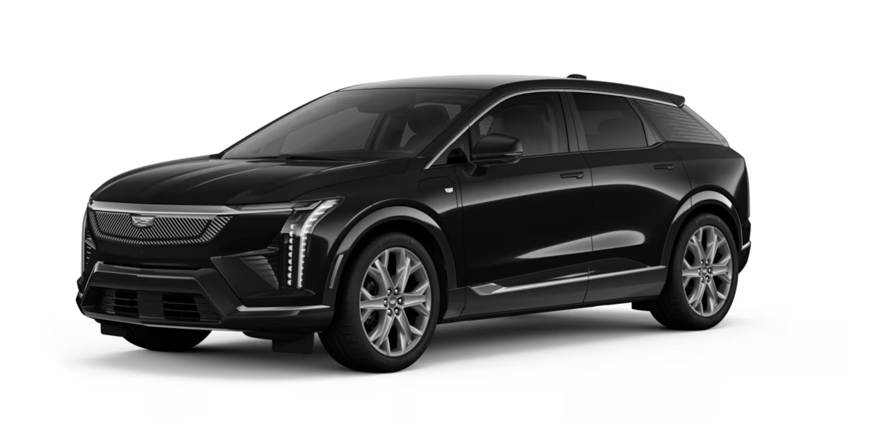 OPTIQ, le SUV de luxe 100 % électrique le plus compact de Cadillac, en teinte Nimbus métallisé, présenté en vue de trois quarts.